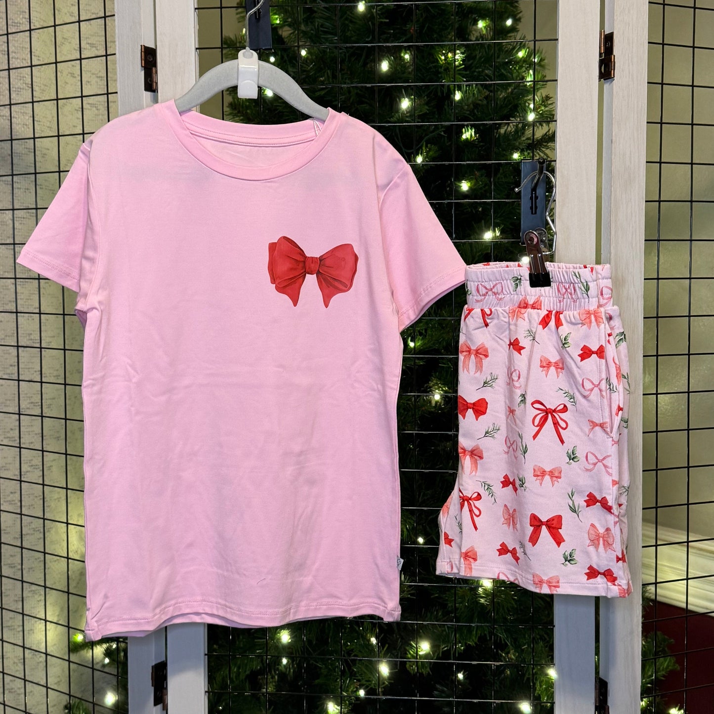 Perfectly wrapped shorts set in front of Christmas tree