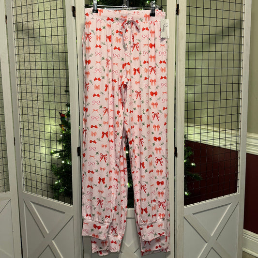 Perfectly Wrapped joggers in front of a Christmas tree